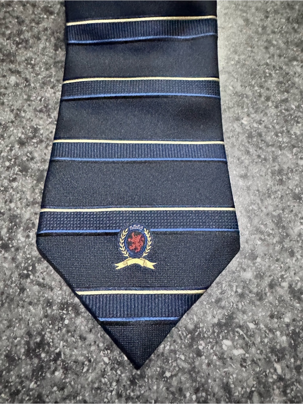 Tommy Hilfiger Navy Tie with Gold and Blue Stripes and Crest